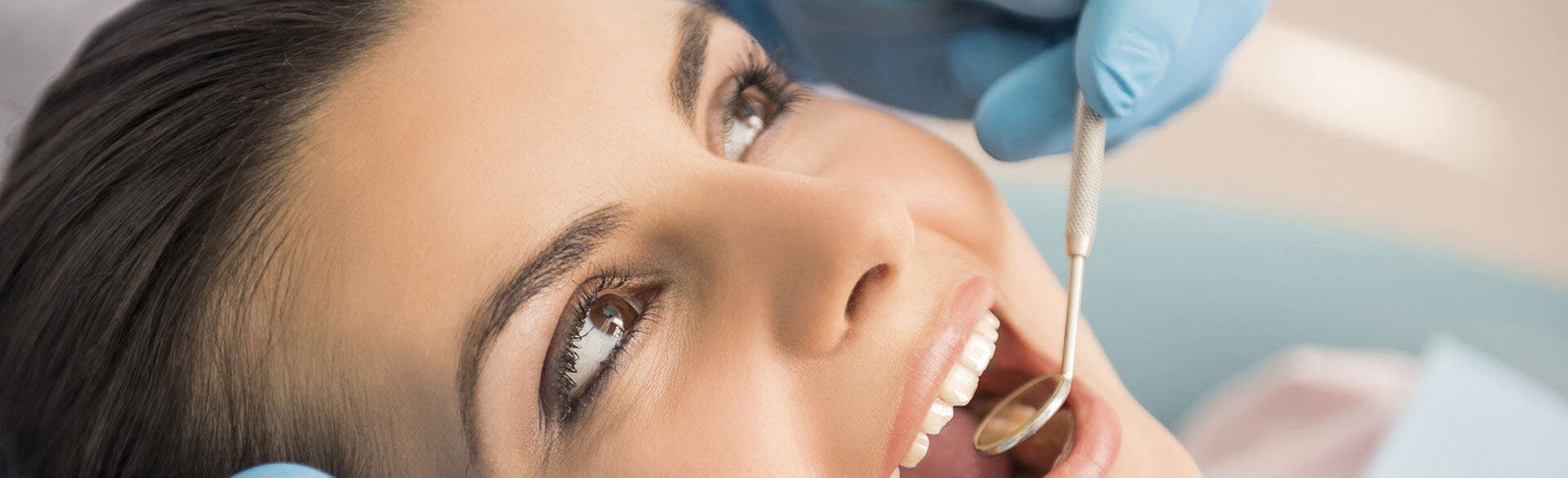 woman receiving a dental exam