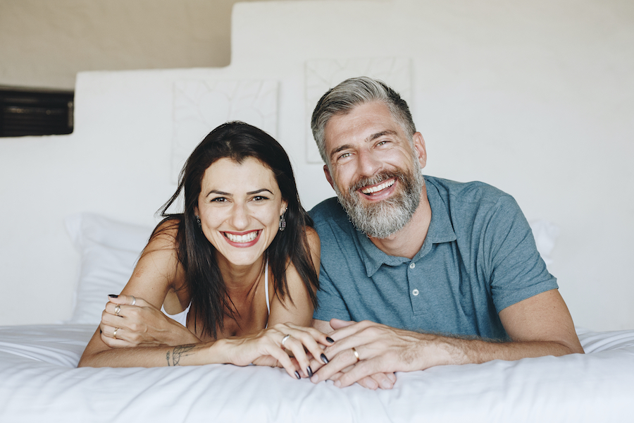 A man and woman smile after receiving prosthodontic care at the dentist in Henderson, NV